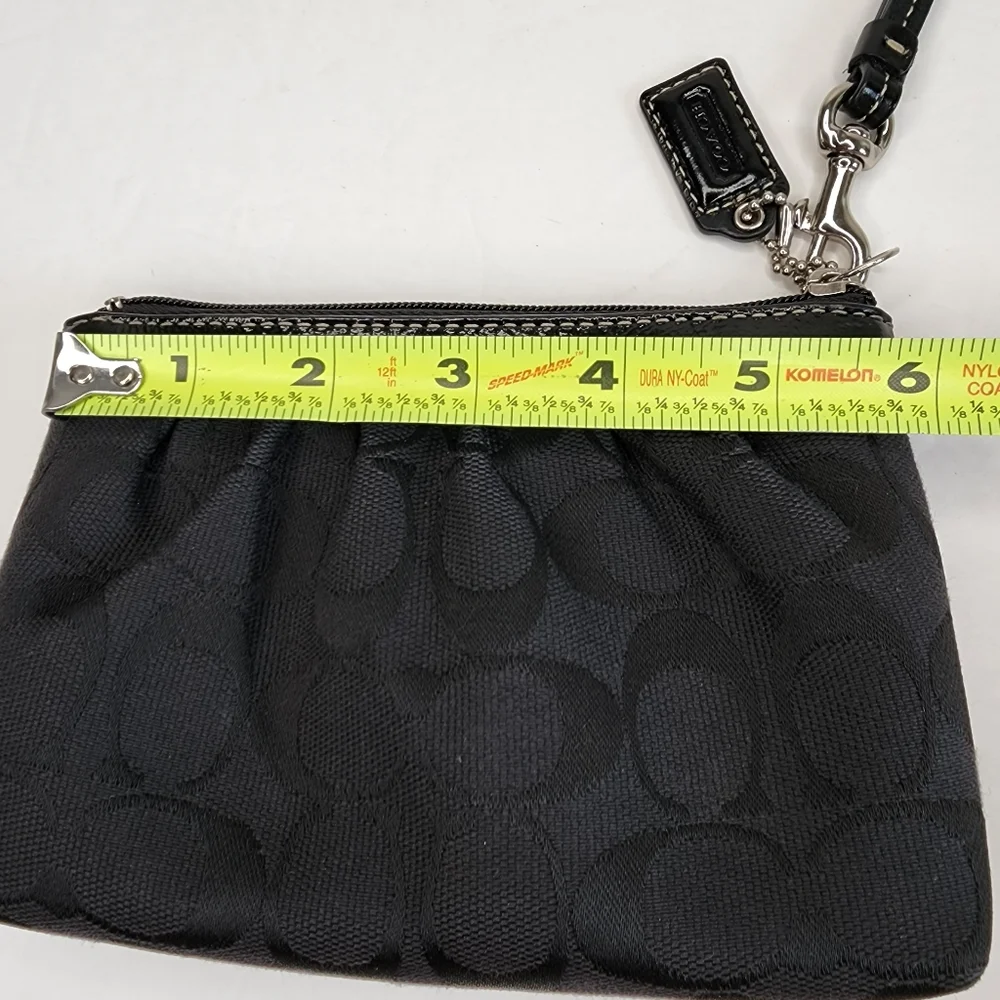Coach wristlet signature